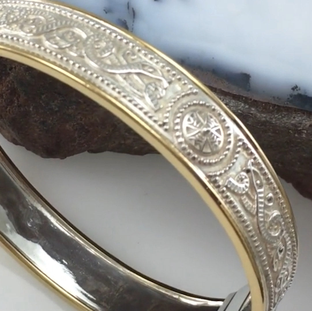 Small Silver and 14K Gold Accent Border Celtic Bangle with open lock MBA211