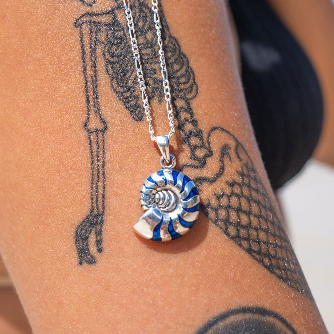 Charmed by the Rhythmic Spiral Sterling Silver Nautilus Pendant TP3106